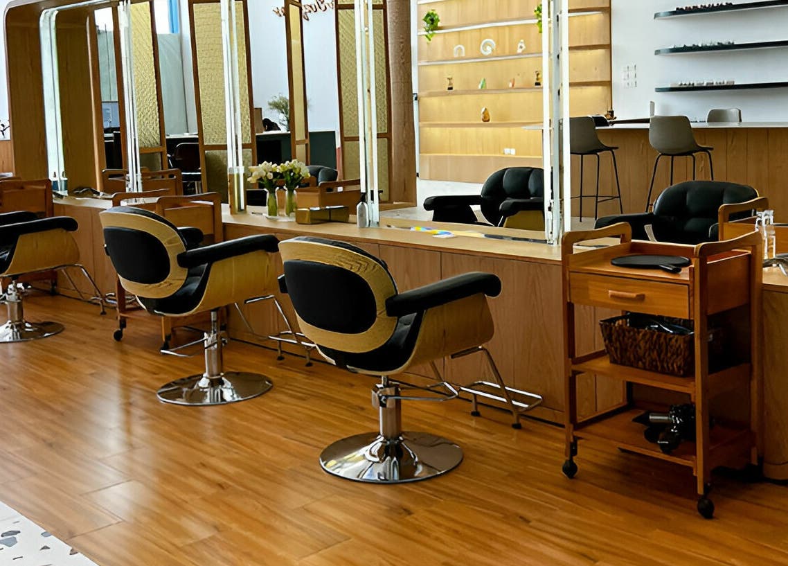 Chic interior of Jeunesse Salon | صالون جونيس, Riyadh, Riyadh Province, SA with modern styling chairs and mirrors.