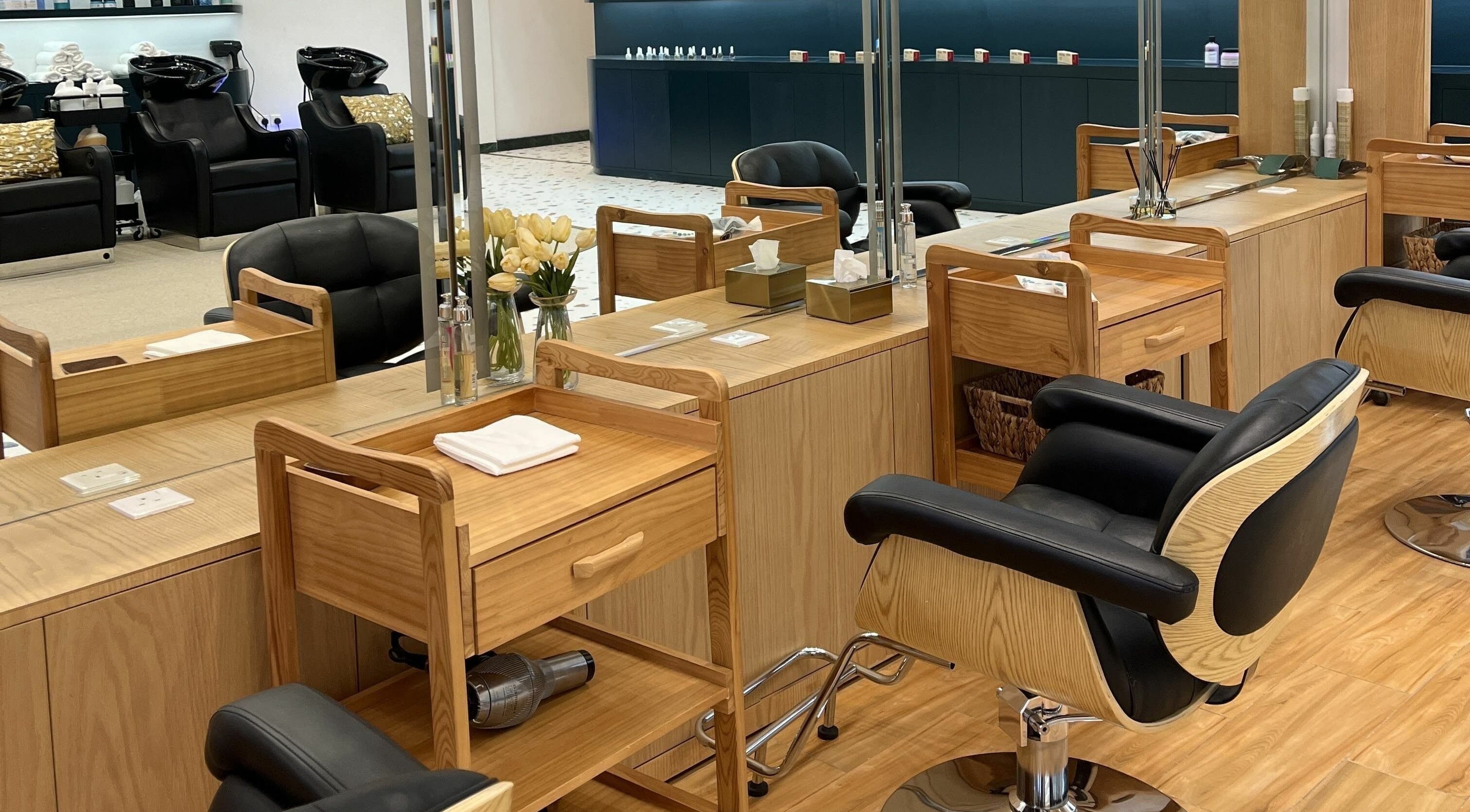 Luxurious interior of Jeunesse Salon | صالون جونيس in Riyadh, Riyadh Province, SA featuring chic styling stations.