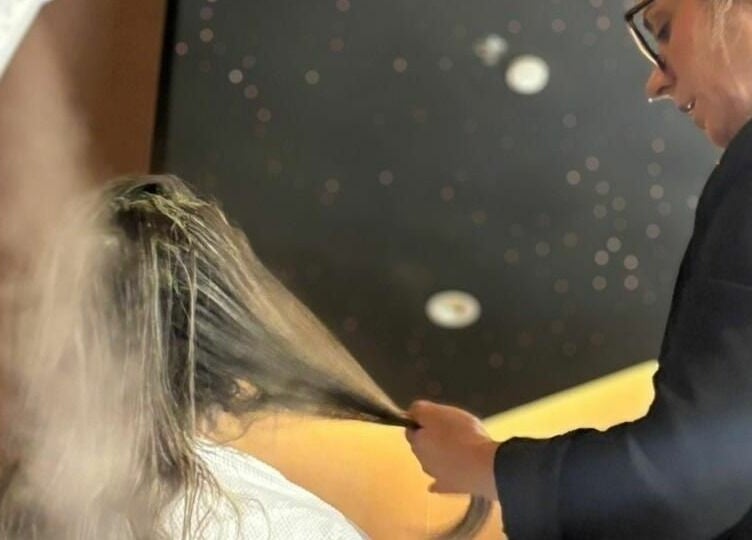 Professional hairstylist at Jeunesse Salon | صالون جونيس in Riyadh, Riyadh Province, SA giving a luxurious hair treatment.