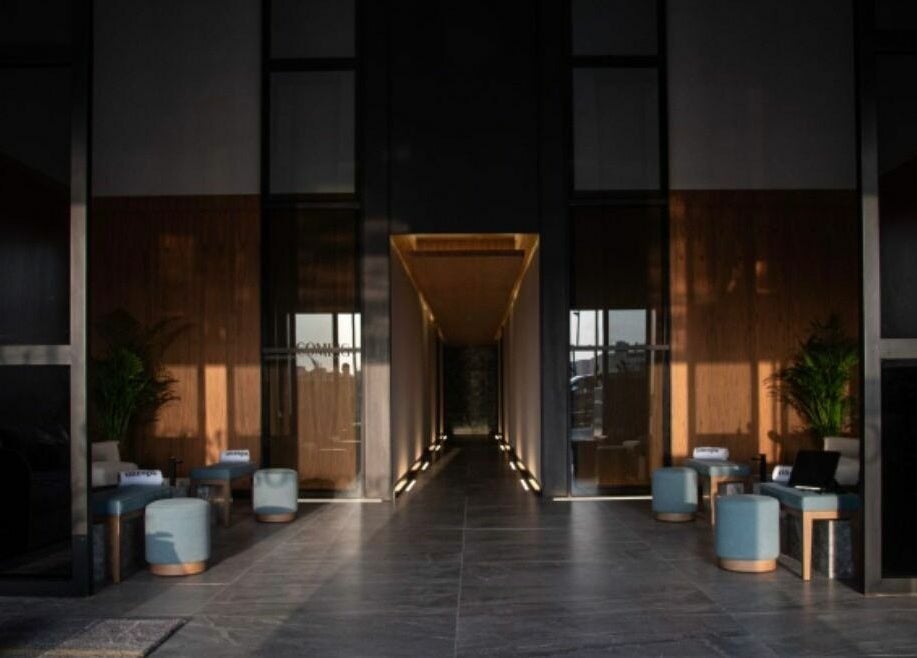 Elegant entrance at One Spa, Riyadh, Riyadh Province, SA with stylish seating and ambient lighting.