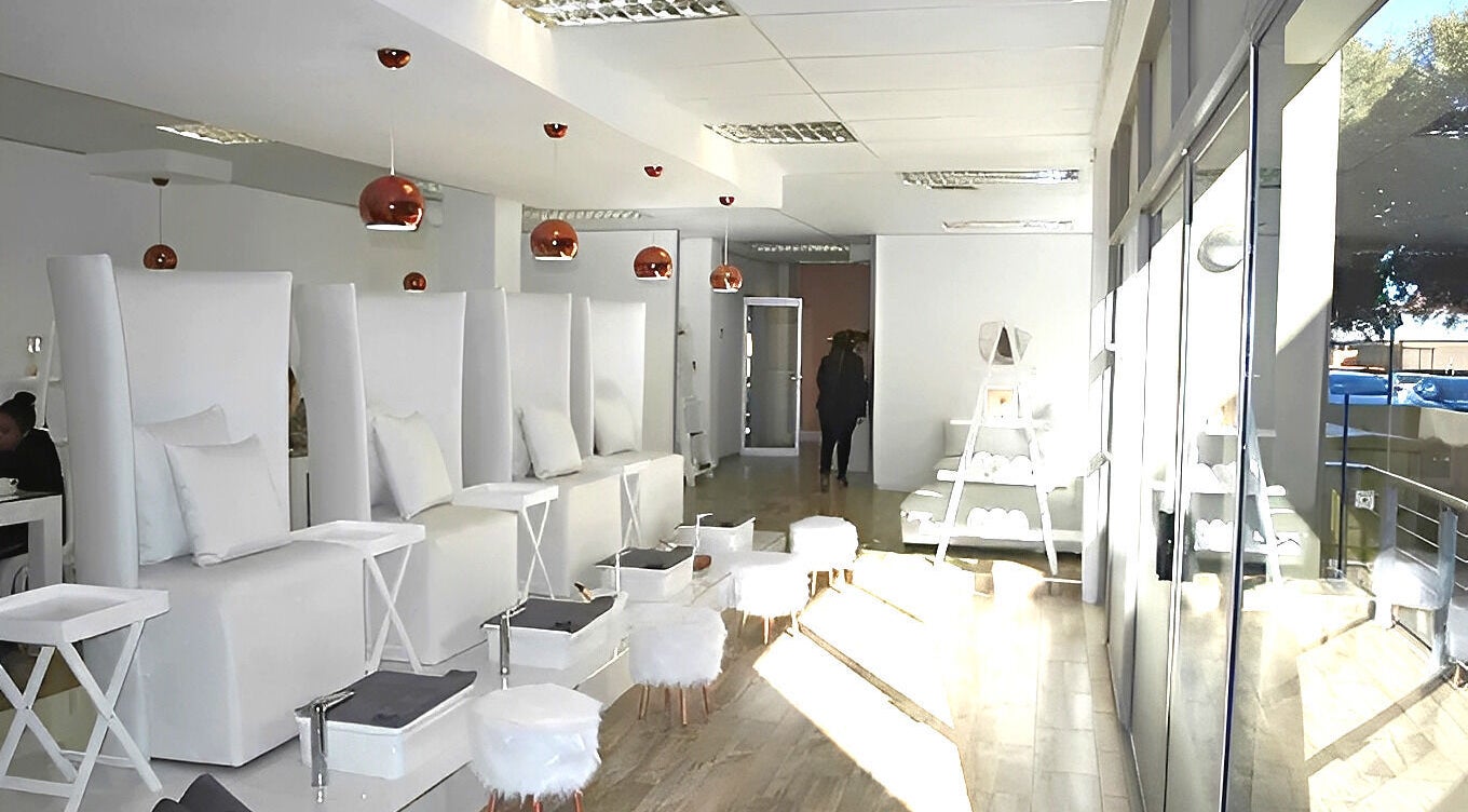 Elegant interior of House of Mack - Nail Bar, Johannesburg, Gauteng, ZA with plush seating and modern decor.