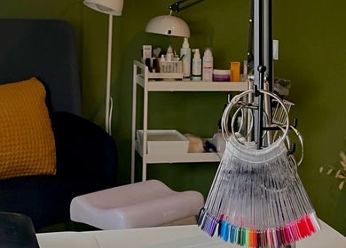 Elegant salon space at Anna Solska Studio, Hoofddorp, Noord-holland, NL, showcasing nail polish samples.