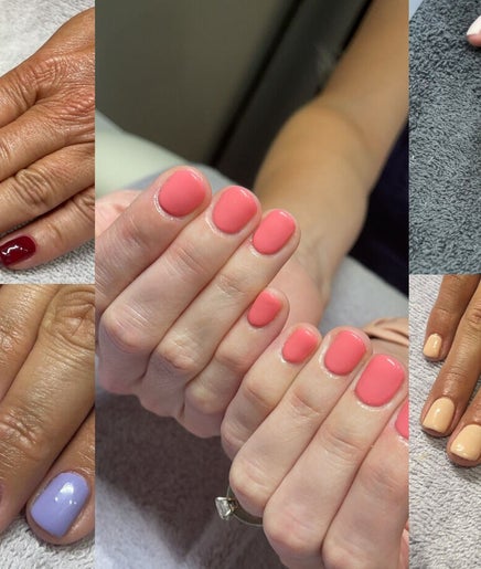 Diverse nail polish colors displayed at Tiffani Blu Studios, Atlanta, Georgia, US showcasing manicure art.