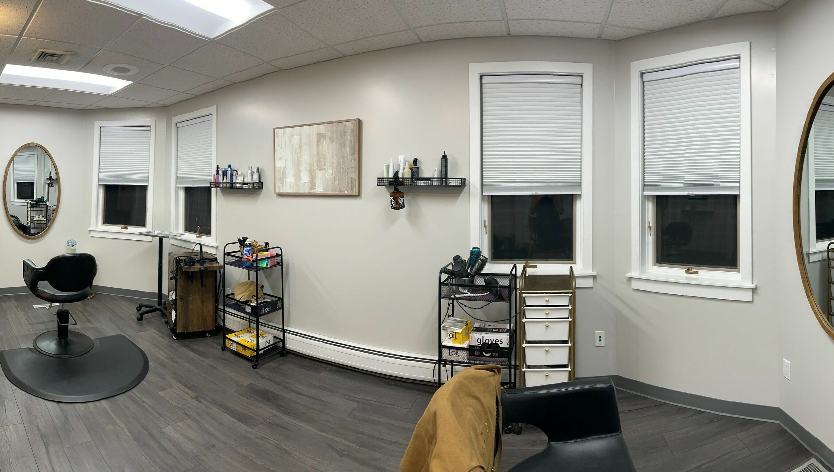 A chic, minimalist salon interior at 66B Salon Meg B and Alicia C, Easthampton, Massachusetts, US.