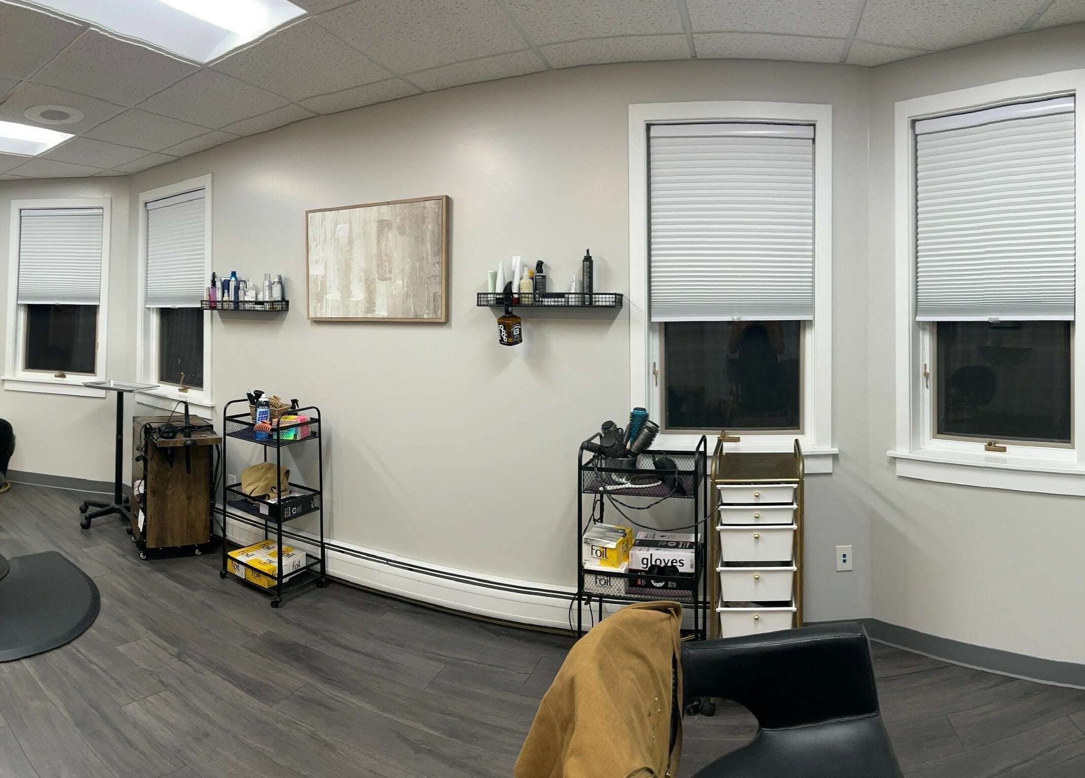 A chic, minimalist salon interior at 66B Salon Meg B and Alicia C, Easthampton, Massachusetts, US.