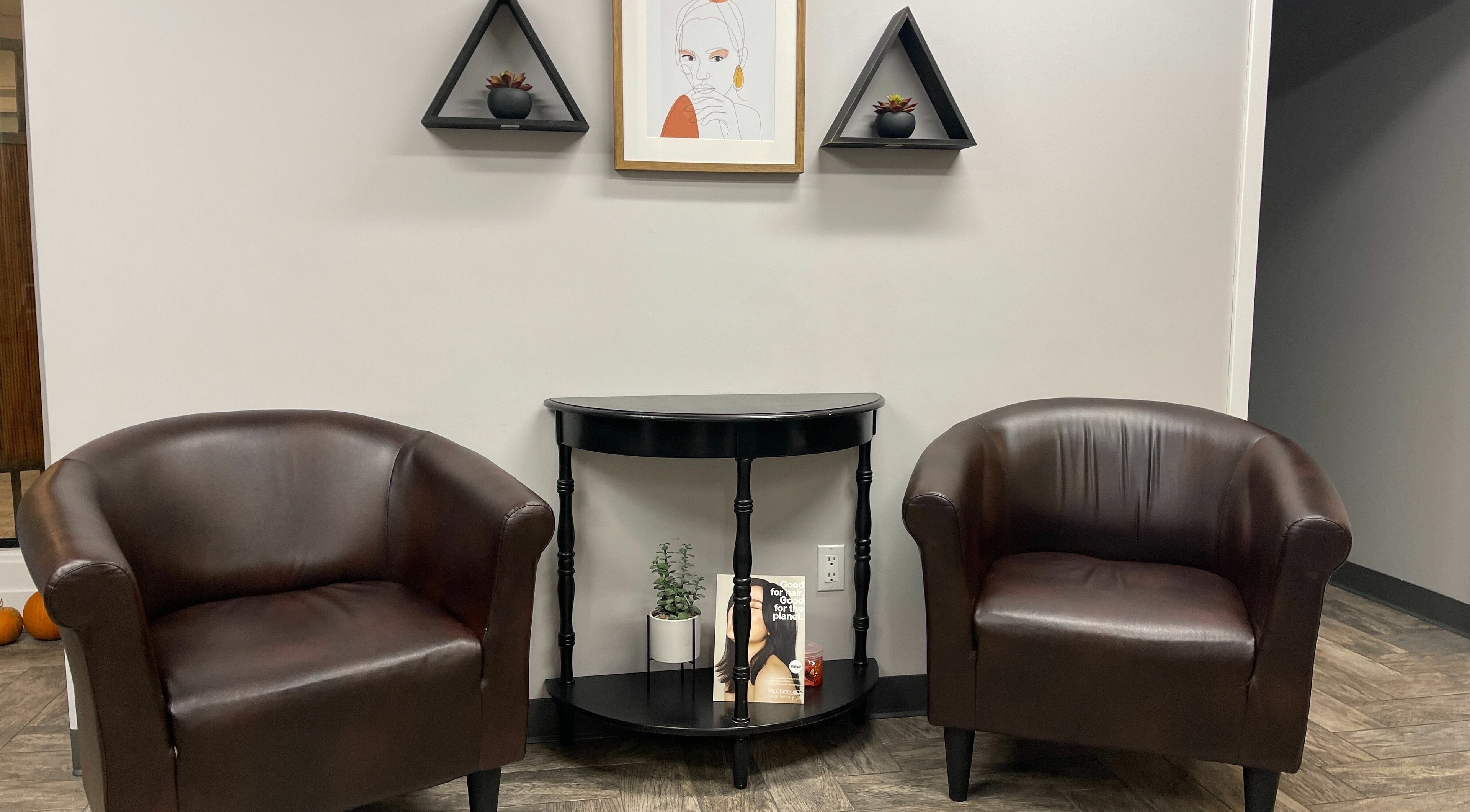 Elegant seating area inside 66B Salon Meg B and Alicia C in Easthampton, Massachusetts, US.