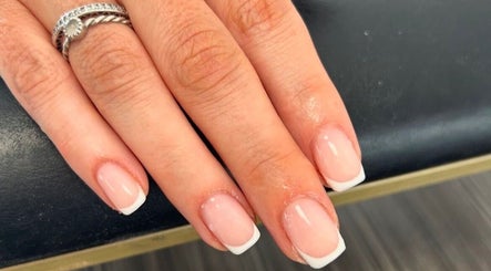 Close-up of a French manicure at Betts Beauty, Farington, England, GB showcasing detailed nail art.