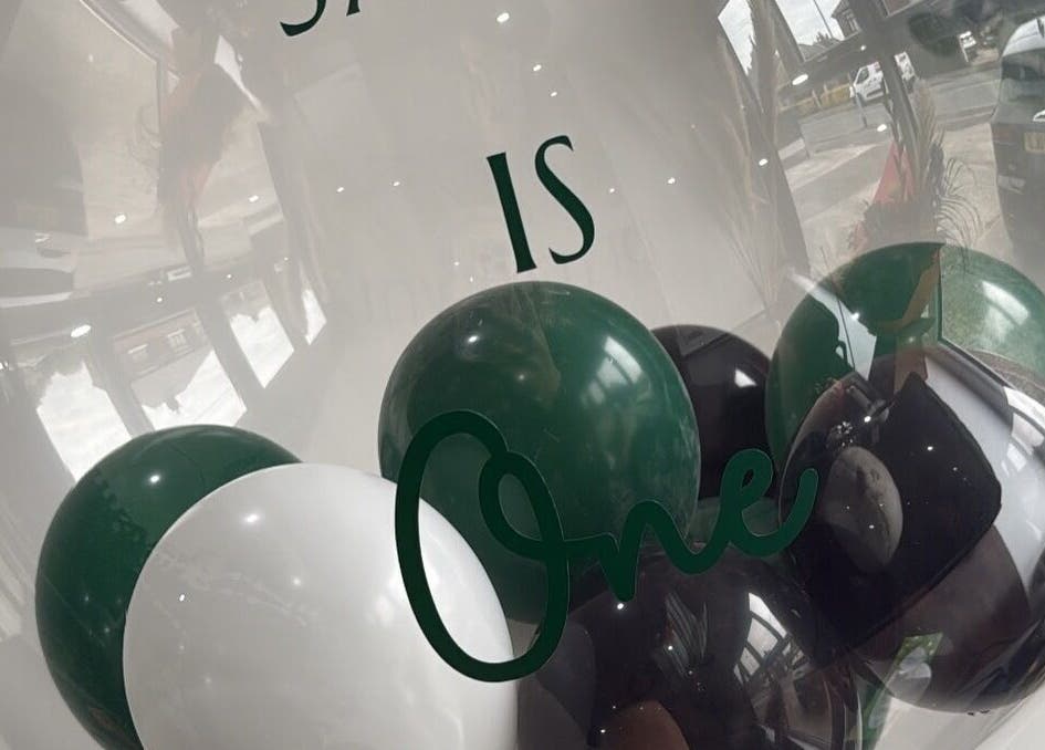 Celebratory balloons at Betts Beauty, Farington, England, GB creating a festive atmosphere.