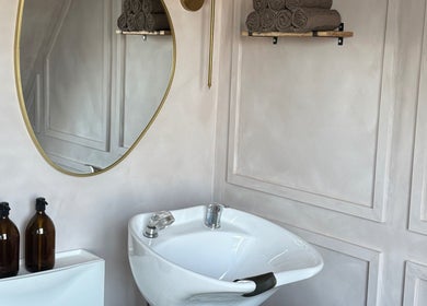 Elegant washbasin and mirror setup at House of RC Hair, Garforth, England, GB.