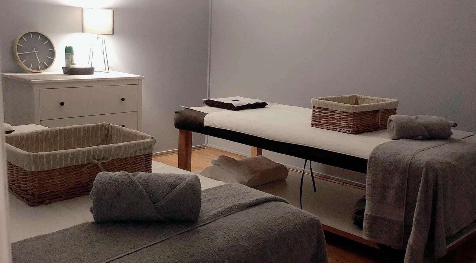 Tranquil massage room at Glebe Thai Therapeutic Massage in Glebe, New South Wales, AU with cozy furnishings.