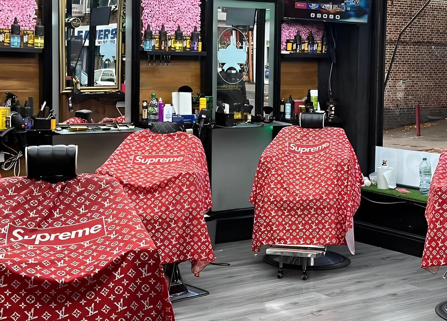 Vibrant barber chairs at N & J Cutz in Coventry, England, GB, showcasing a trendy salon setup.