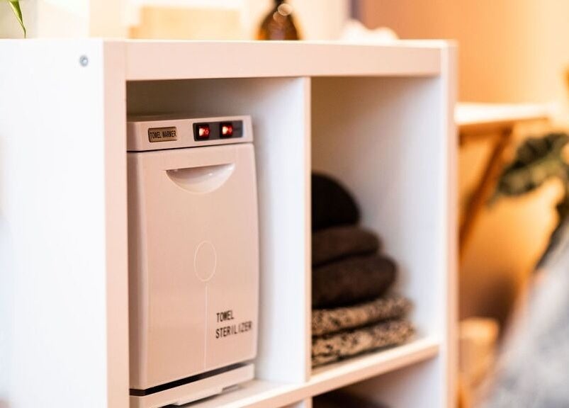 Towel sterilizer at Bethan Owen Complementary Healthcare, Cardiff Bay, Wales, GB, showcasing clean wellness.
