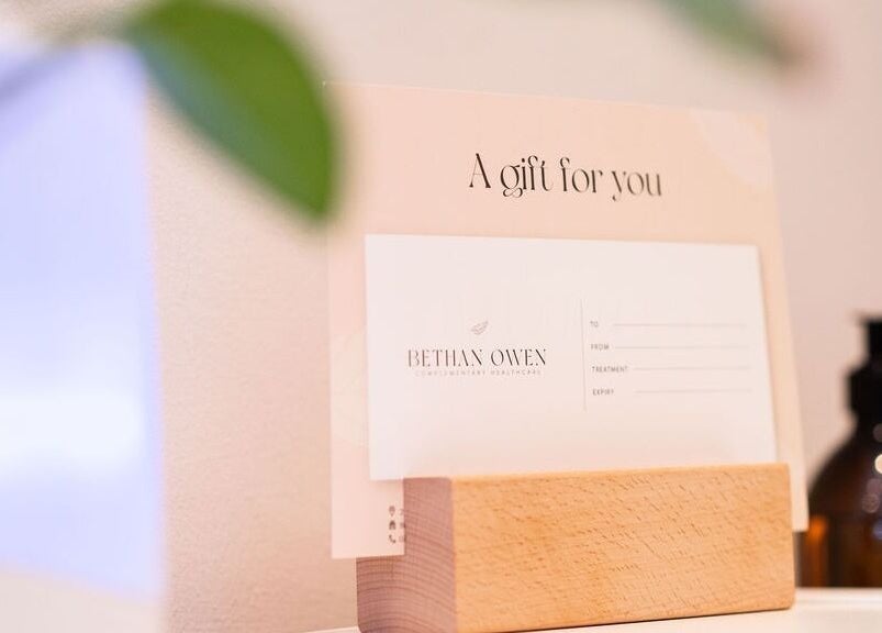 Gift card stand at Bethan Owen Complementary Healthcare in Cardiff Bay, Wales, GB.