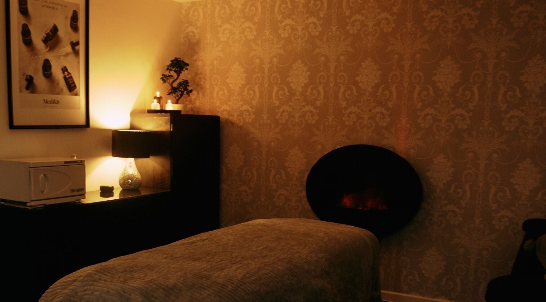 Warm spa interior at KV Beauty Ltd, Rotherham, England, GB with relaxing ambiance and elegant decor.