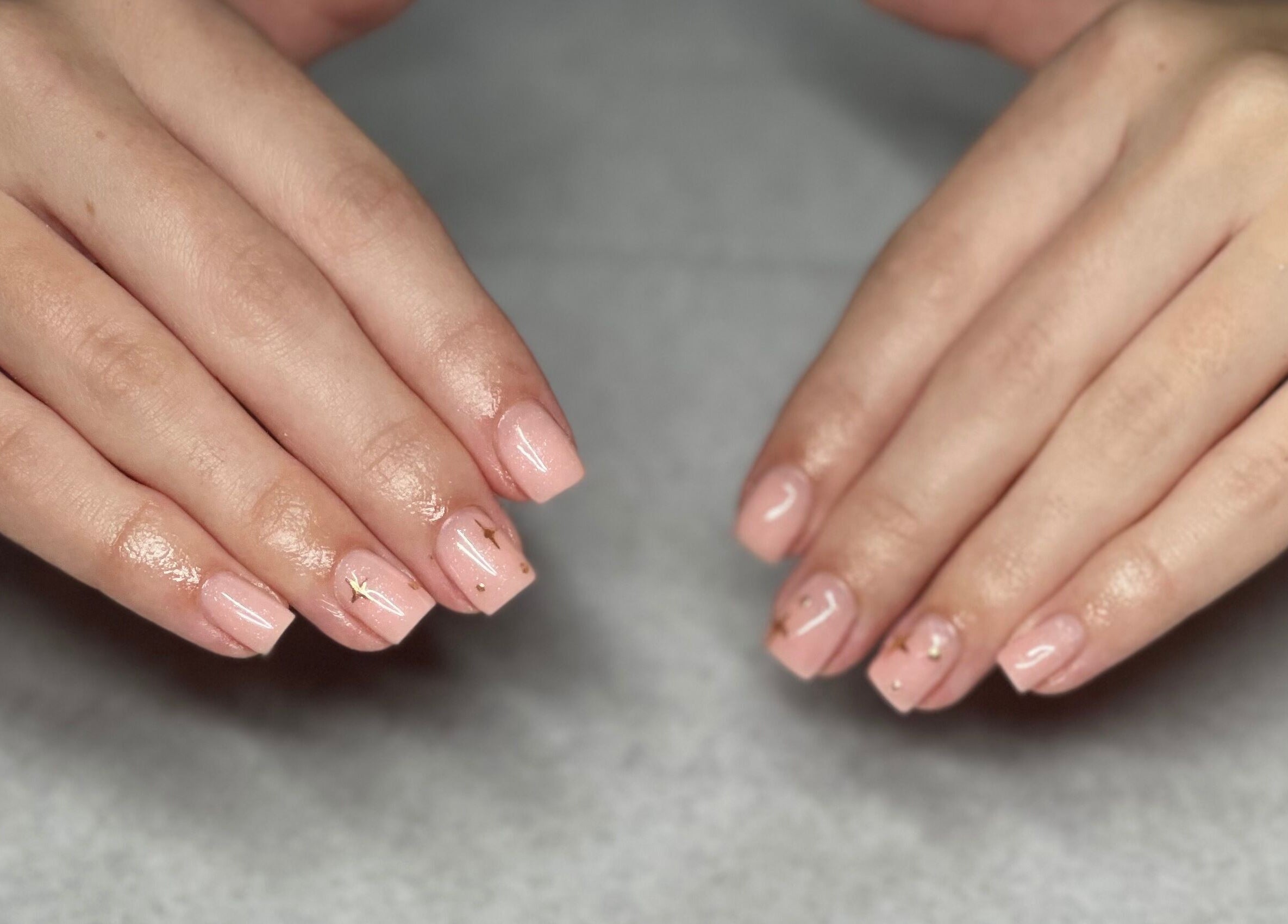 Chic nail art at Beauty Lounge, Bargoed, Wales, GB. Perfectly polished nails with delicate embellishments.