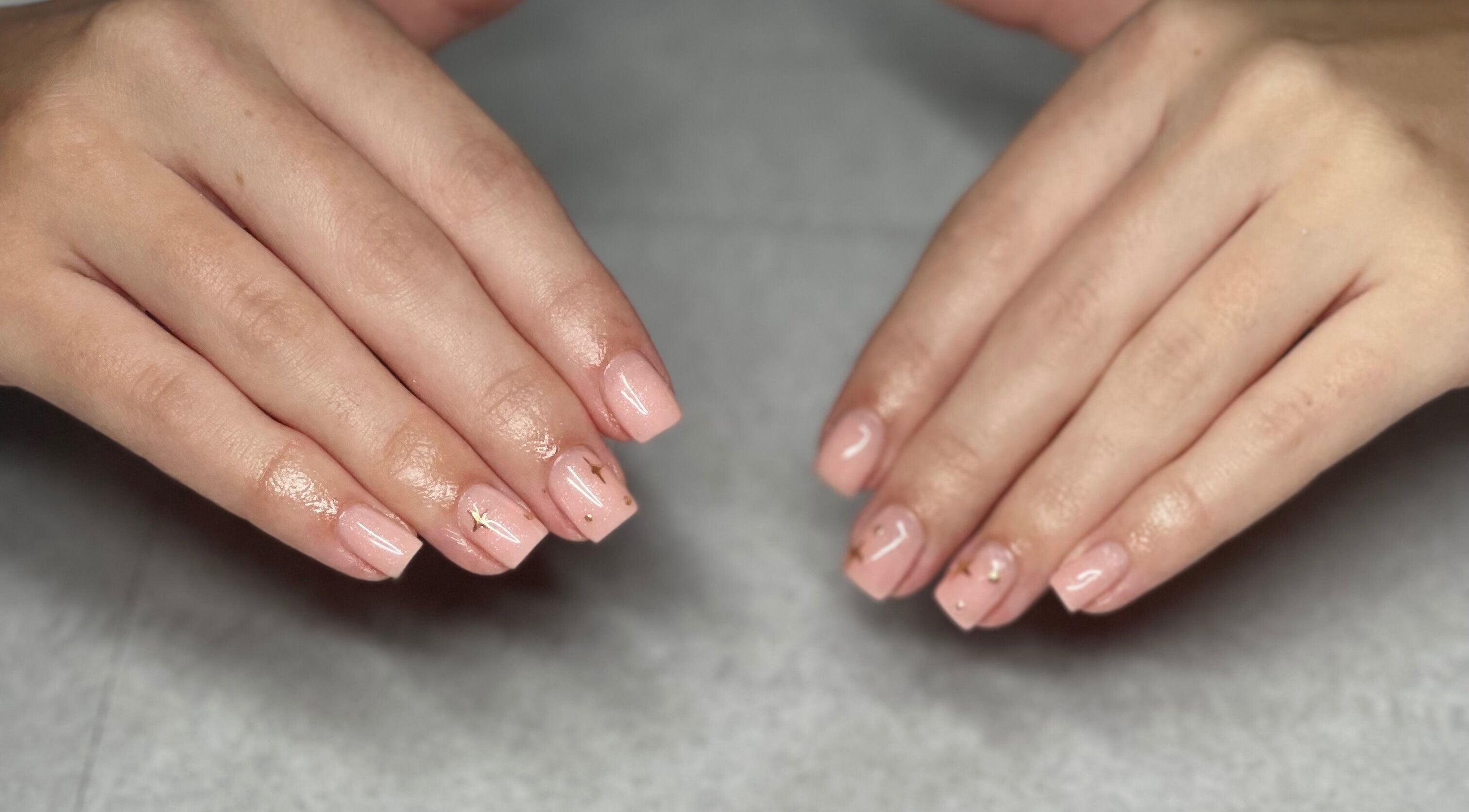 Chic nail art at Beauty Lounge, Bargoed, Wales, GB. Perfectly polished nails with delicate embellishments.