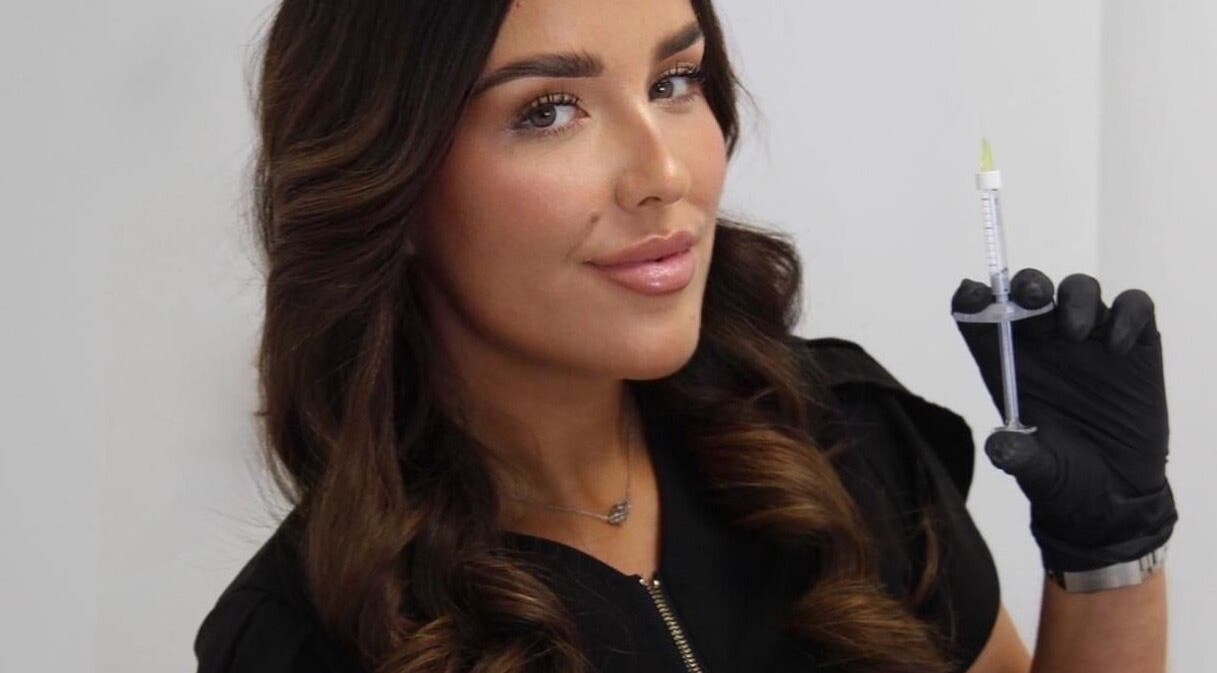 Beauty specialist holding a syringe at LJT Aesthetics, Herne Bay, England, GB.