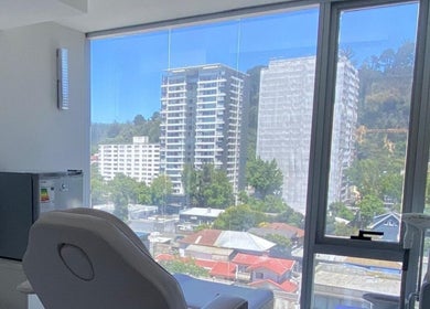 Vista panorámica desde Clínica Florencia en Concepción, Bío Bío, CL, mostrando paisaje urbano.
