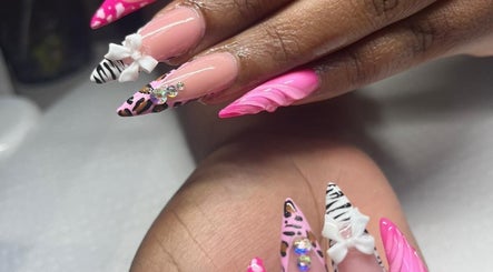 Vibrant pink and animal print nails at The Glory House, Nassau, New Providence, BS.