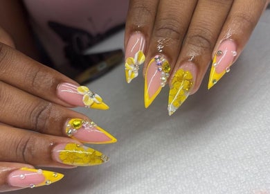 Exquisite yellow and floral nail art at The Glory House, Nassau, New Providence, BS.
