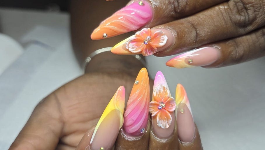 Vibrant floral nail art on display at The Glory House, Nassau, New Providence, BS.