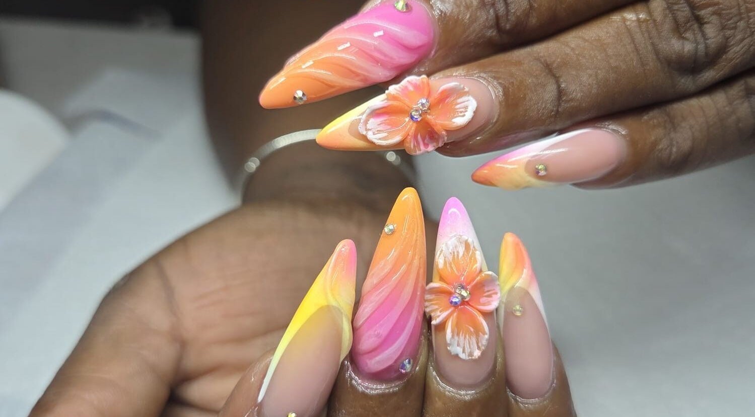 Vibrant floral nail art on display at The Glory House, Nassau, New Providence, BS.
