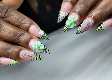 Intricate floral nail art at The Glory House, Nassau, New Providence, BS offering elegant beauty services.