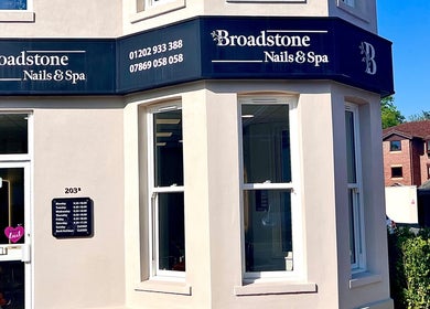 Entrance of Broadstone Nails and Spa in Poole, England, GB, showcasing the elegant exterior and signage.