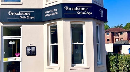 Entrance of Broadstone Nails and Spa in Poole, England, GB, showcasing the elegant exterior and signage.