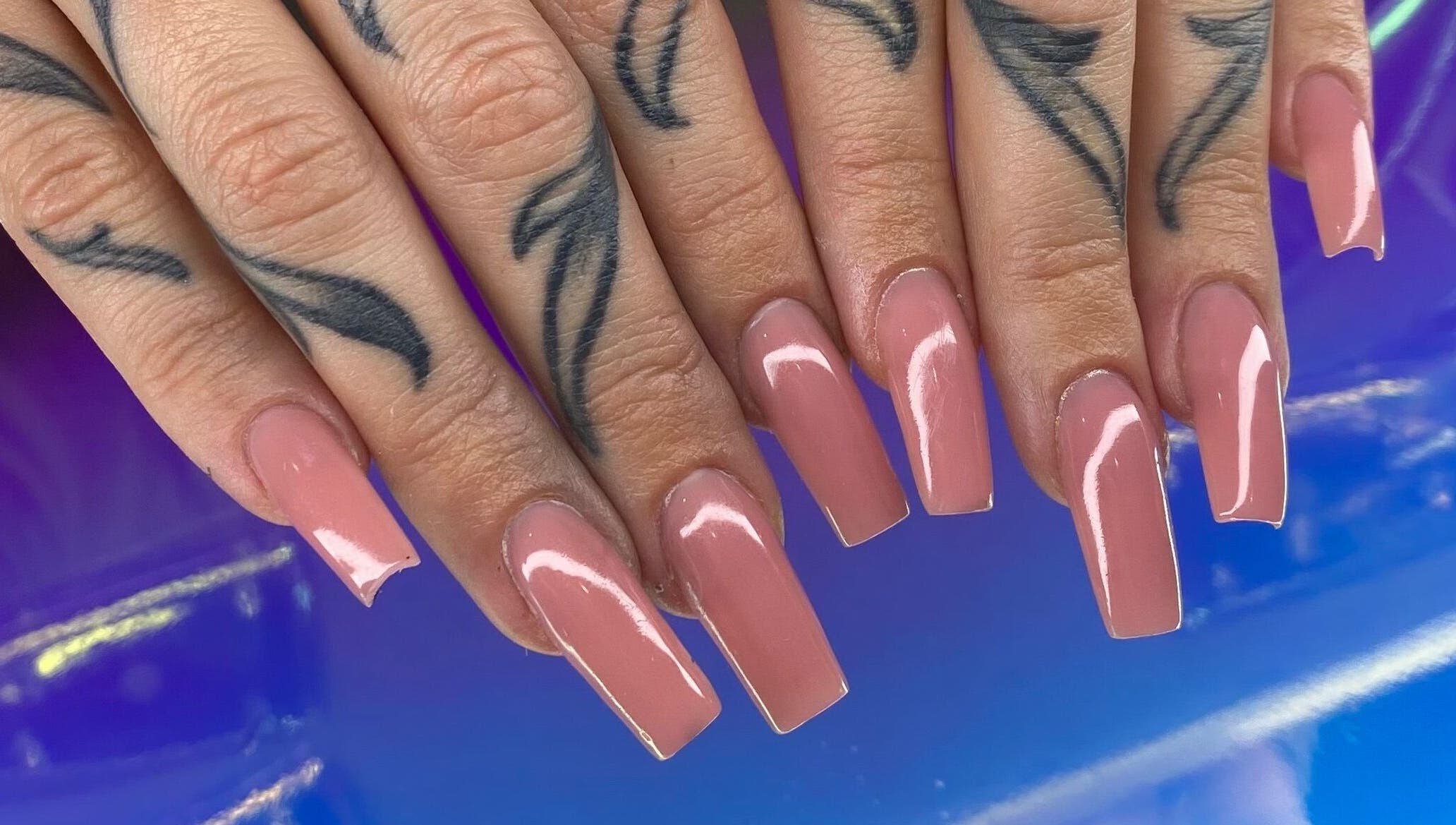 Beautiful pink manicured nails at A Dose of Sof, Vancouver, British Columbia, CA.