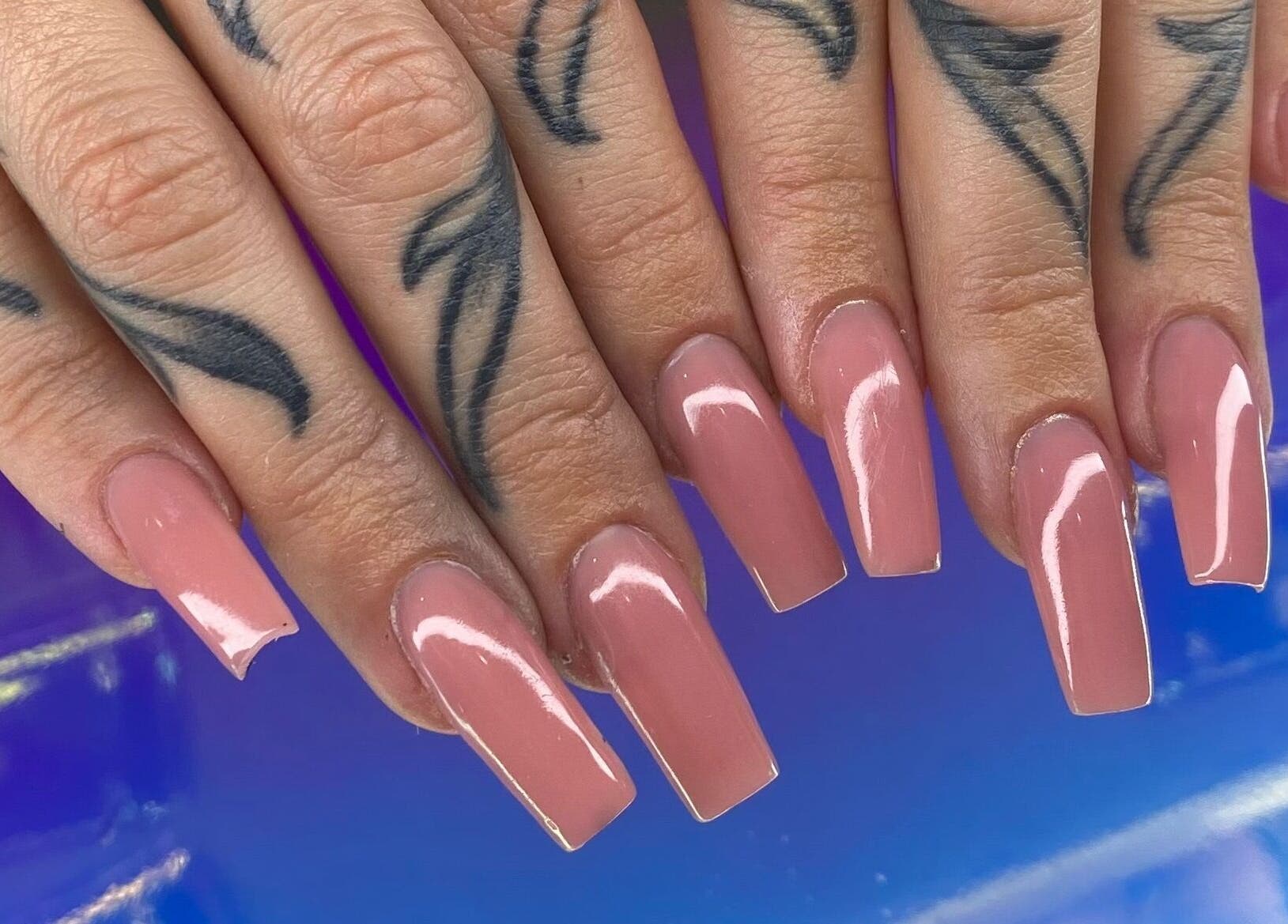 Beautiful pink manicured nails at A Dose of Sof, Vancouver, British Columbia, CA.