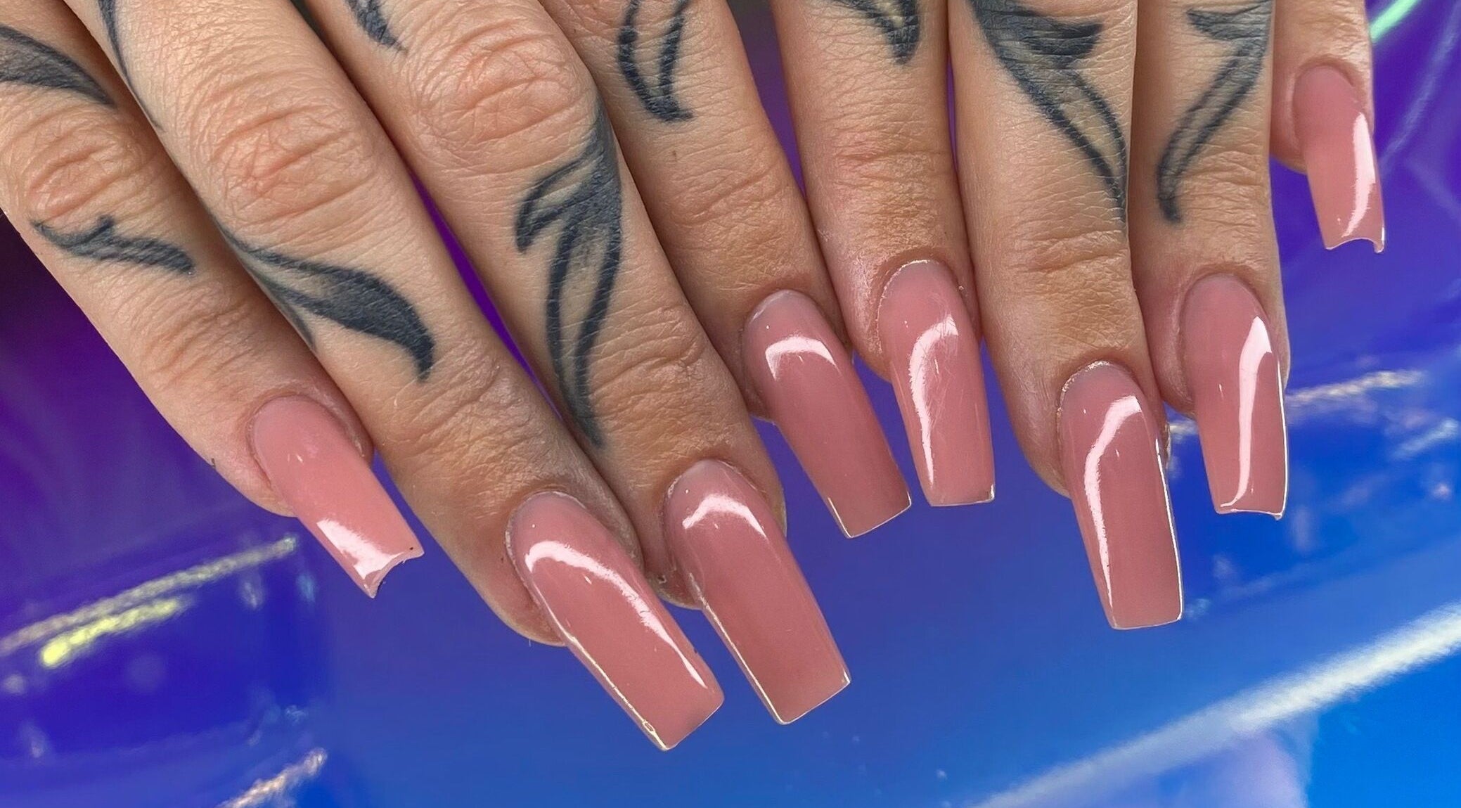 Beautiful pink manicured nails at A Dose of Sof, Vancouver, British Columbia, CA.