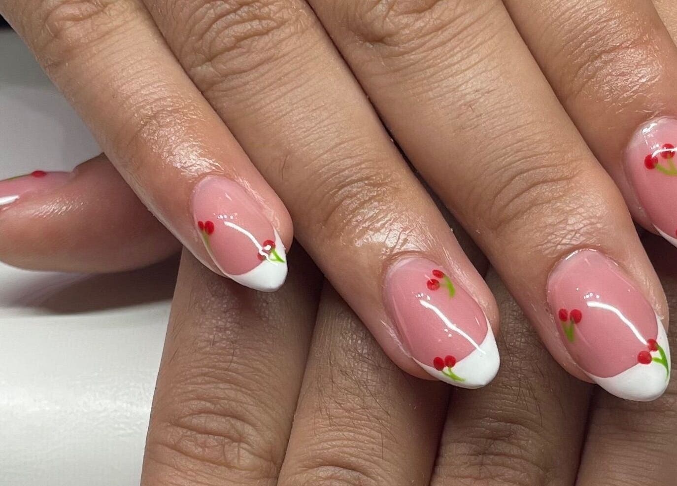 Stylish cherry nail art with french tips at A Dose of Sof, Vancouver, British Columbia, CA.