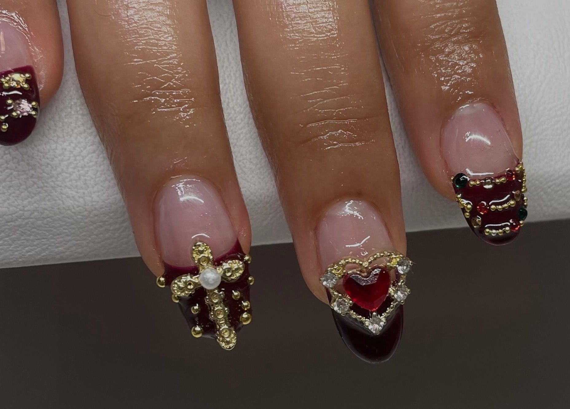 Embellished nails with intricate designs at A Dose of Sof, Vancouver, British Columbia, CA.