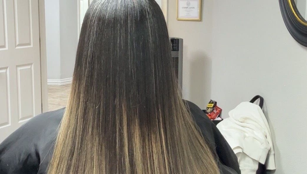 Sleek straight hair styled at Studio M in Euless, Texas, US, showcasing expert hairstyling services.