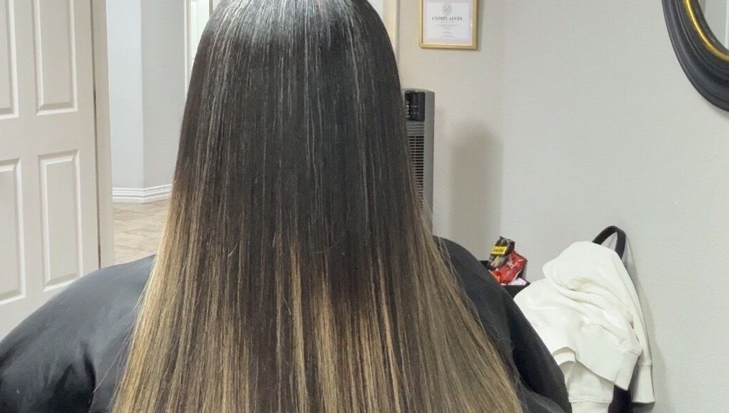 Sleek straight hair styled at Studio M in Euless, Texas, US, showcasing expert hairstyling services.
