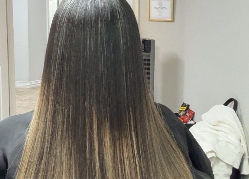 Sleek straight hair styled at Studio M in Euless, Texas, US, showcasing expert hairstyling services.