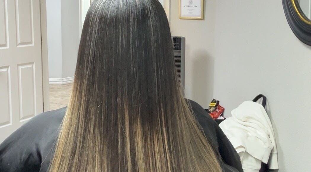 Sleek straight hair styled at Studio M in Euless, Texas, US, showcasing expert hairstyling services.