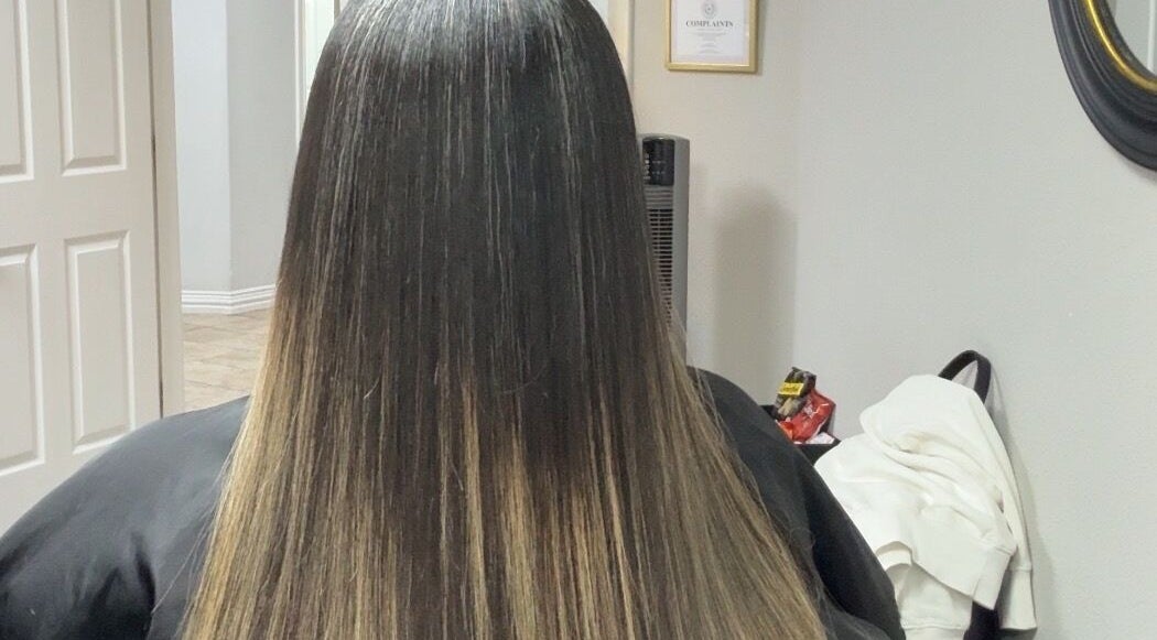 Sleek straight hair styled at Studio M in Euless, Texas, US, showcasing expert hairstyling services.