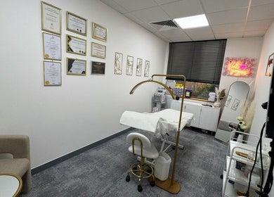 Elegant treatment room at Mitch Aesthetics London, Uxbridge, England, GB with sleek interiors and modern decor.