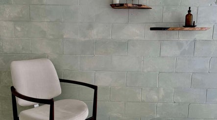 Minimalist seating area at Nurture, Byron Bay, New South Wales, AU with neutral tones and modern décor.