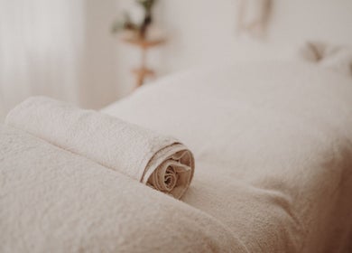 Luxurious massage bed setup at Nurture, Byron Bay, New South Wales, AU, offering relaxation and wellness.