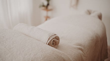 Luxurious massage bed setup at Nurture, Byron Bay, New South Wales, AU, offering relaxation and wellness.