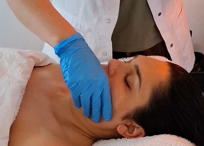 Relaxing facial massage at Golden Tree Holistic Therapies, Tuffley, England, GB promoting wellness and serenity.