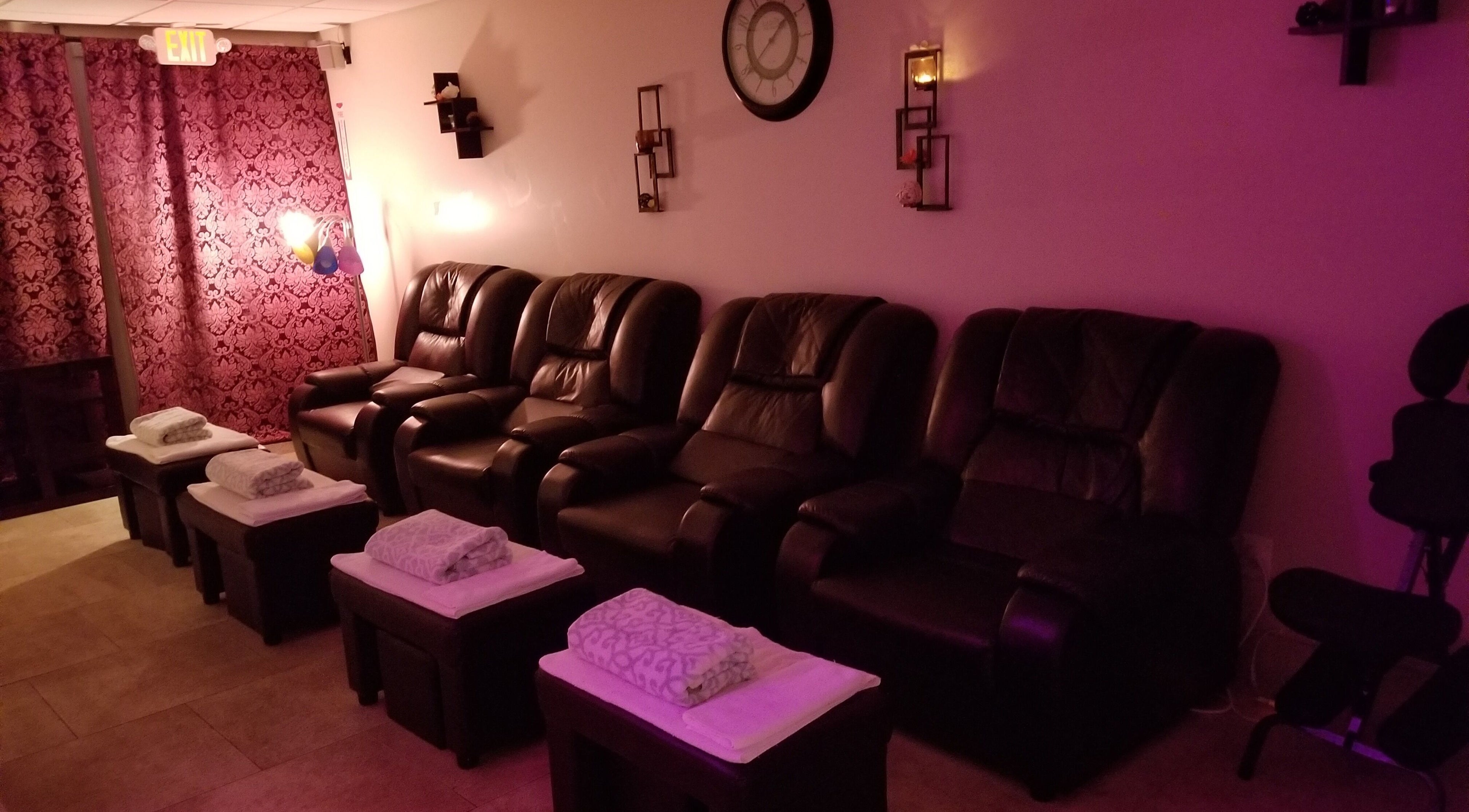 Comfortable massage chairs at New Rose Spa in Cherry Hill, New Jersey, US, creating a soothing ambiance.