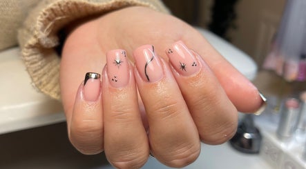 Nail art with galaxy design at Kd Beauty in Eastwood, England, GB, showcasing elegant and trendy nail style.