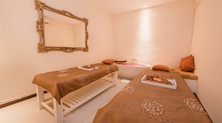Relaxing spa room at Ambiente Spa at Rama Residence Petitenget, Bali, Bali, ID, featuring elegant decor and soothing vibes.