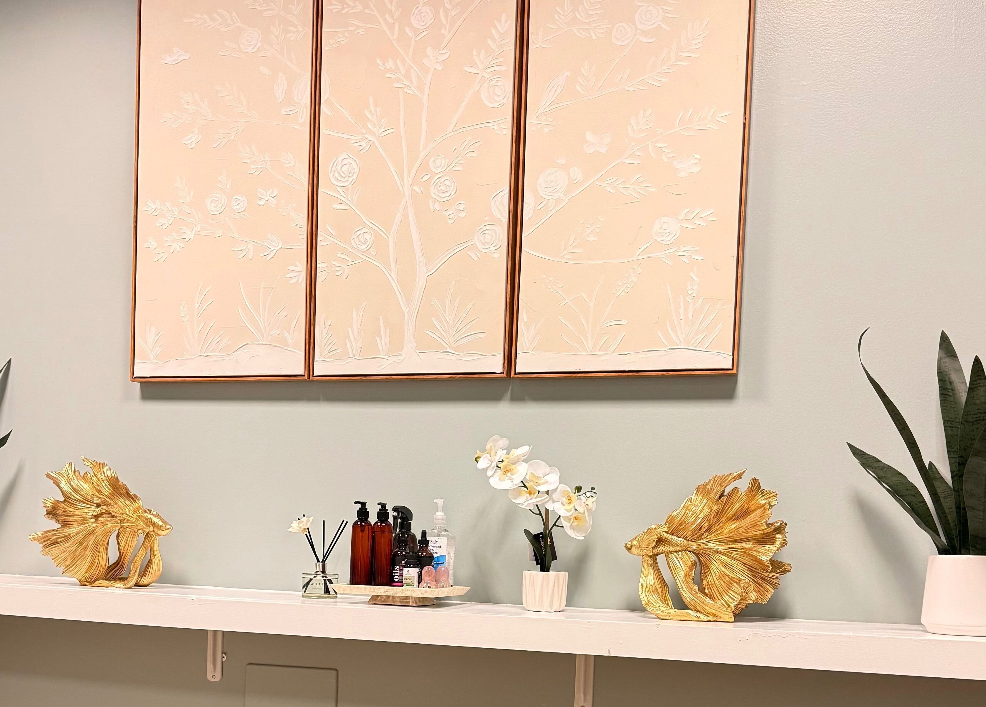 Elegant decor at Chhaya Thai Spa Danvers, featuring plants and art in Danvers, Massachusetts, US.