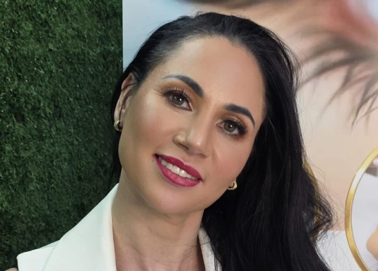 Smiling woman at L and B International, Sandton, Gauteng, ZA with beauty focus.