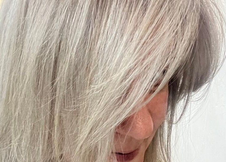 Beautiful silver hairstyle at L and B International, Sandton, Gauteng, ZA, showcasing expert salon services.